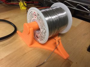 Roll of Solder on 3D Printed Stand